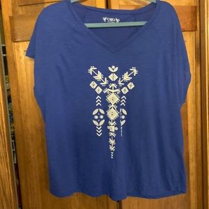 Cato royal blue shirt sleeve top with white design on front.  SZ 18/20W